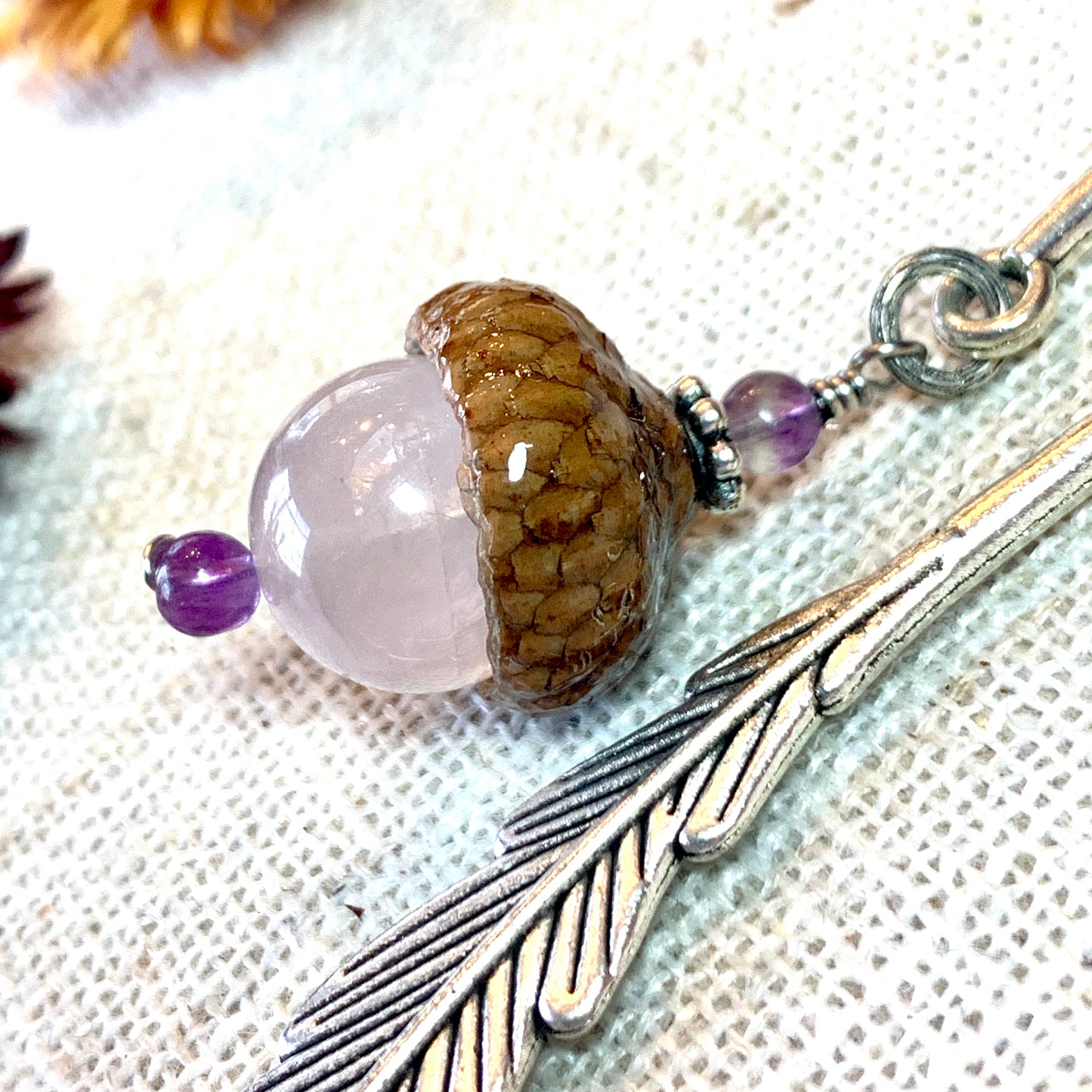 a close up of a piece of jewelry on a table