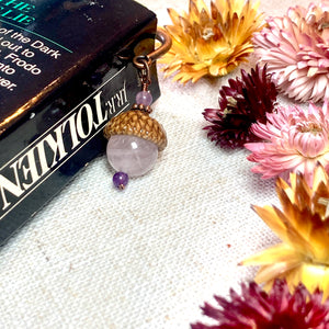a book and some flowers on a table