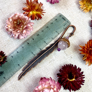 a close up of flowers and a ruler on a table